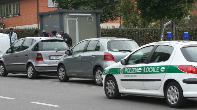 Parcheggiatori in Largo Barozzi